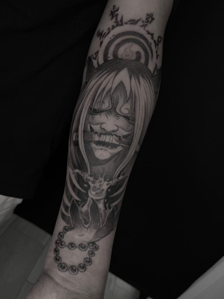 tattoo-japones-dibujo-manga-mordiendo-cuchillo